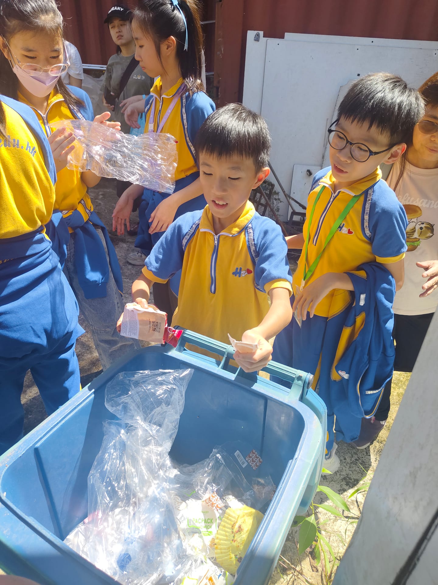 Student sorting food waste